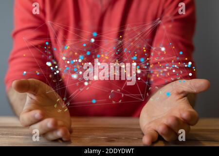 Un rendu 3D de lignes futuristes inspirées de la science-fiction avec un personne réelle la tenant Banque D'Images