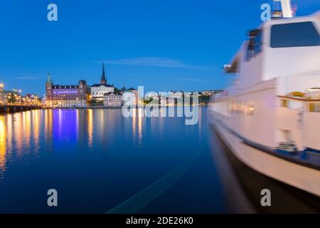 View of Riddarholmen and Sodermalm at dusk from near Town Hall, Stockholm, Sweden, Scandinavia, Europe Stock Photo