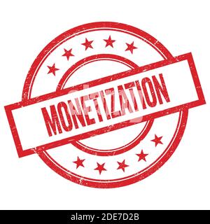 Texte DE MONÉTISATION écrit sur le timbre rouge rond vintage en caoutchouc. Banque D'Images