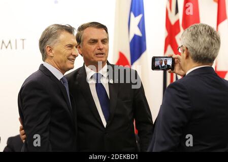 Mauricio Macri (Président de l'Argentine) et Jair Bolsonaro (Président du Brésil) - événement parallèle organisé par le Premier ministre japonais, sur le thème "promouvoir la place des femmes au travail" au centre de congrès Intex Osaka au sommet du G20 à Osaka, au Japon, le 29 juin 2019. Photo de Dominque Jacovides/Pool/ABACAPRESS.COM Banque D'Images