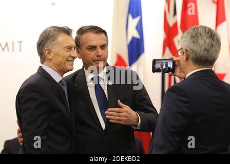 Mauricio Macri (Président de l'Argentine) et Jair Bolsonaro (Président du Brésil) - événement parallèle organisé par le Premier ministre japonais, sur le thème "promouvoir la place des femmes au travail" au centre de congrès Intex Osaka au sommet du G20 à Osaka, au Japon, le 29 juin 2019. Photo de Dominque Jacovides/Pool/ABACAPRESS.COM Banque D'Images