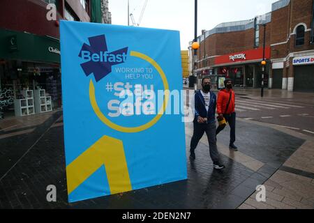 Belfast : des rues vides à la veille de la photo de Noël Mal McCann Banque D'Images