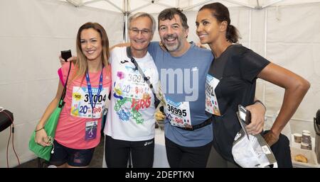 Laurent Petitguillaume, Stephane Plaza et Karine le Marchand au 20 kilomètres de Paris, une course sur route de 20 kilomètres qui commence au Pont d'Iena au pied de la Tour Eiffel à Paris, France, le 13 octobre 2019. Photo de Loic Baratoux/ABACAPRESS.COM Banque D'Images