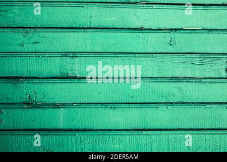 Arrière-plan en bois couleur vert clair, texture en bois, vieux mur peint Banque D'Images