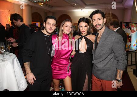 Adrien Erka et sa compagnie Carla Ginola, Jade Leboeuf et son mari Stéphane Rodrigues lors de la visite du Grand Diner à l'Hôtel Marriott Paris champs-Elysées, a Paris, France le 18 décembre 2019. Photo de Jerome Domine/ABACAPRESS.COM Banque D'Images