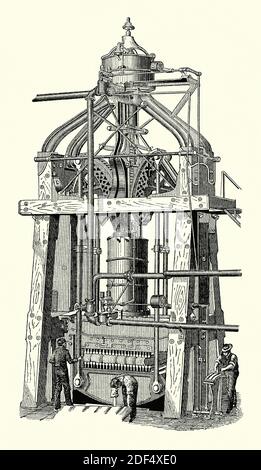 Une vieille gravure montrant des hommes travaillant à la presse de pressage de Grader, qui a été utilisée pour compacter des balles de coton aux États-Unis – et des articles similaires encombrants – pour faciliter le transport dans les années 1800. Il est issu d'un livre victorien d'ingénierie mécanique des années 1880. Cette immense presse à bois et à fer possède deux cylindres à vapeur au-dessus et en dessous. L'un ou les deux peuvent être activés pour compacter des éléments en fonction de la force requise pour effectuer la compression. Banque D'Images