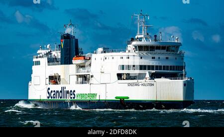 Scandlines ferry Schlesvig Holstein quittant le port de Rodbyhavn en direction de l'Allemagne. Banque D'Images