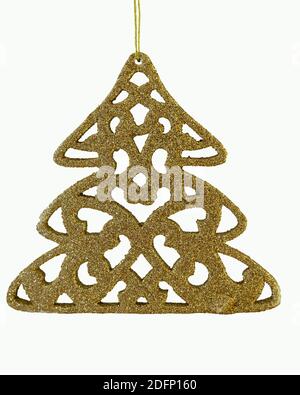Une œuvre d'art en forme d'arbre de Noël de couleur dorée utilisée pour décorer un arbre de Noël ou à l'intérieur de la maison. Banque D'Images