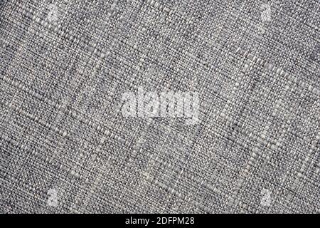 Vue de dessus de la texture du tissu. Tissu gris pour un gros plan sur le rembourrage. Arrière-plan textile, lignes diagonales. Arrière-plan abstrait de tissu de rembourrage pour les meubles Banque D'Images