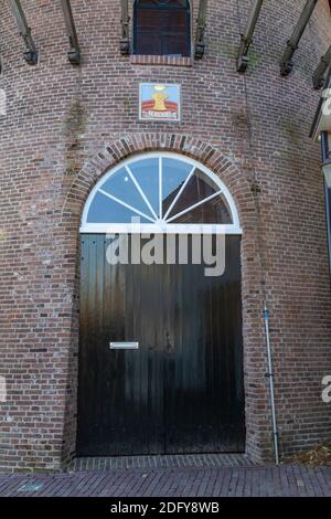 Culemborg, pays-Bas - 6 novembre 2020 : entrée du moulin à vent restauré de Hoop dans le centre de Culemborg, dans le pays de Gelderland, aux pays-Bas. Banque D'Images
