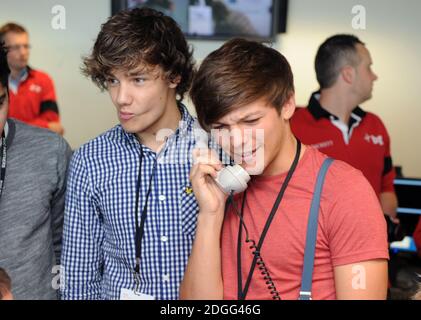 (De gauche à droite) Liam Payne et Louis Tomlinson d'une direction à la BGC Global Charity Day, Canary Wharf, Londres. Banque D'Images