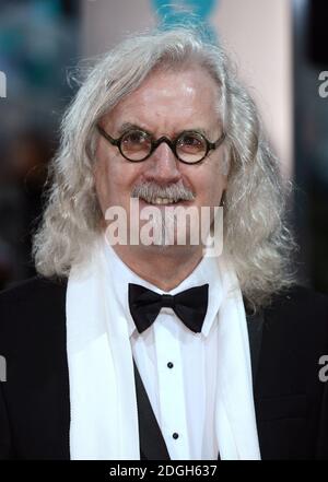 Billy Connolly arrive à l'EE British Academy film Awards 2013, à l'Opéra royal de Londres. Banque D'Images