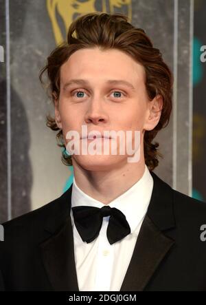 George MacKay arrivant aux EE British Academy film Awards 2014, au Royal Opera House, Bow Street, Londres. Banque D'Images