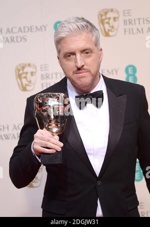 Anthony McCarten, lauréat du prix du meilleur écran adapté pour le film « The Theory of Everything » dans la salle de presse des EE British Academy film Awards 2015, qui se tiennent à l'Opéra royal de Covent Garden, Londres, Royaume-Uni. Banque D'Images