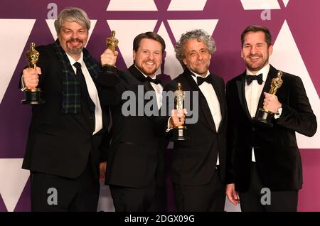 Paul Lambert, Ian Hunter, Tristan Myles et J.D. Schwalm avec le prix des meilleurs effets visuels pour First Man dans la salle de presse aux 91st Academy Awards qui se tiennent au Dolby Theatre à Hollywood, Los Angeles, États-Unis Banque D'Images