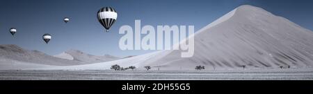 Dunes et ballons dans le désert du Namib à l'horizon, Namibie, Afrique. Banque D'Images