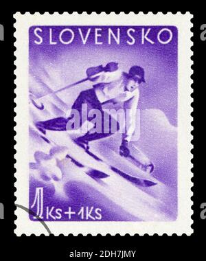 SLOVAQUIE - VERS 1939 : timbre-poste annulé imprimé par la Slovaquie, qui montre l'homme ski , vers 1939. Banque D'Images