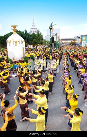 Grouping with a large of unidentified peoples are folk Dance to worship the Khon Kaen City Pillar Shrine on the  celebration of International silk . Stock Photo