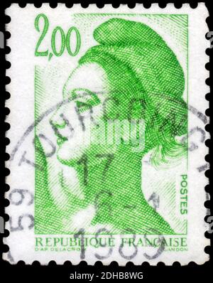Saint-Pétersbourg, Russie - 27 septembre 2020 : timbre imprimé en France avec l'image de la liberté, vers 1987 Banque D'Images