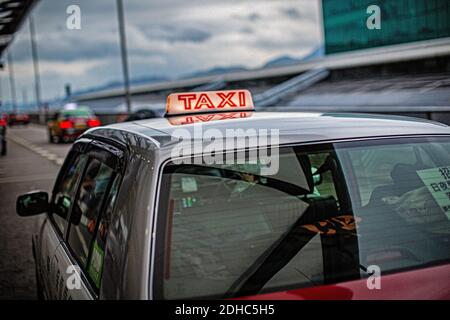 Taxi à l'aéroport international de Hong Kong Banque D'Images