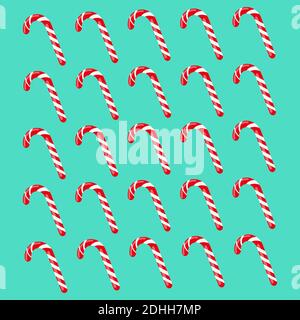 Candy Canes rayées rouge et blanc sur une illustration vectorielle de fond de menthe poivrée. Illustration de Vecteur