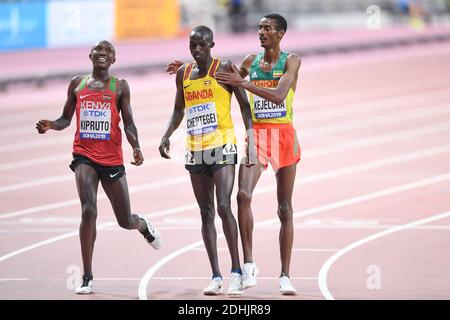 Joshua Cheptegei (Ouganda, or), Yomif Kejelcha (Ehtiopia, argent), Rhonex Kipruto (Kenya, bronze). 10000 mètres de finale. World Athletics Doha 2019 Banque D'Images