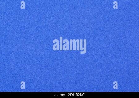 Fond de papier de velours bleu. Gros plan sur une texture en velours. Copiez la texture en velours de l'espace pour votre conception. Banque D'Images