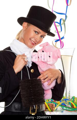 Weiblicher Schornsteinfeger zu Silvester, Fotomontage, Konfetti und Luftschlangen, Banque D'Images