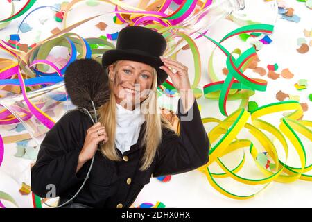 Weiblicher Schornsteinfeger zu Silvester, Fotomontage, Luftschlangen und Konfetti, Banque D'Images