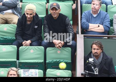 Roschdy Zem avec son fils Chad et Henri Leconte dans le VIP Tribune lors de l'Open de tennis français à l'arène Roland-Garros à Paris, France, le 1er juin 2016. Photo par ABACAPRESS.COM Banque D'Images