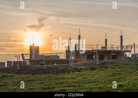 Coucher de soleil sur un chantier de construction Banque D'Images