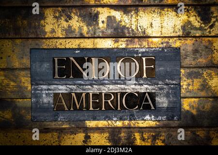 End of America text on vintage textured bronze grunge copper and gold background Stock Photo