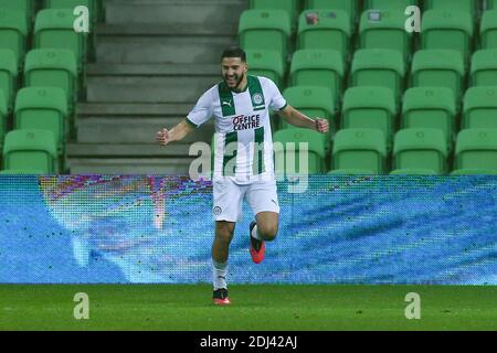 GRONINGEN, PAYS-BAS - DÉCEMBRE 12: L-R: Ahmed El Messaoudi du FC Groningen célèbre après avoir marquant son premier but pendant le néerlandais Eredivisi Banque D'Images