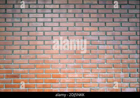 La texture du mur de briques rouges porté par le temps. Mur de briques Banque D'Images