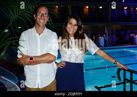 Exclusif. Yohann Diniz et Karine Ferri assistent à la fête de la piscine Fitbit à la piscine Molitor (piscine Molitor) à Paris, France, le 13 septembre 2016. Photo d'Aurore Marechal/ABACAPRESS.COM Banque D'Images