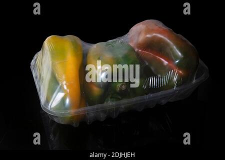 Vegetable wrapped in plastic Stock Photo