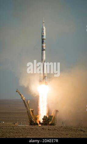 BAIKONUR COSMODROME, KAZAKHSTAN - 07 November 2013 - Winter Olympics torch in space...The Soyuz TMA-11M rocket is launched with Expedition 38 Soyuz Co Stock Photo