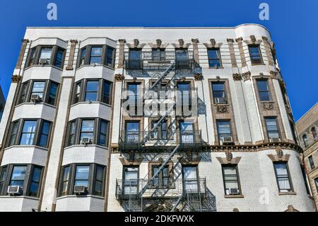 View of old apartment buildings and fire escapes in New York City Stock Photo