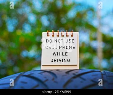 Text Written On A Notepad With Blurred Green Background. Road Traffic Concept Stock Photo
