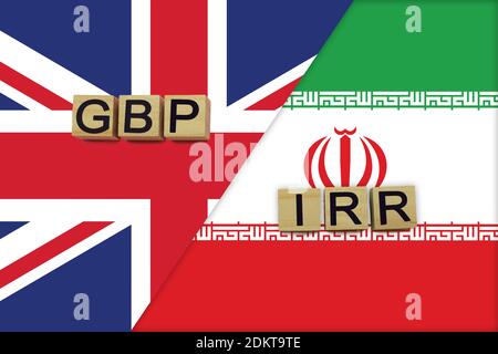 Codes de devises du Royaume-Uni et de l'Iran sur fond de drapeaux nationaux. Concept de transfert d'argent international Banque D'Images