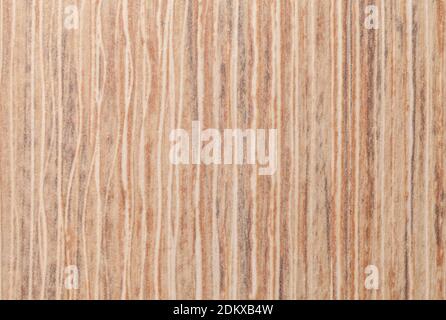 Texture de fond en bois beige avec motif rayé, gros plan. Papier peint décoratif brun avec effet bois, toile de fond. Banque D'Images