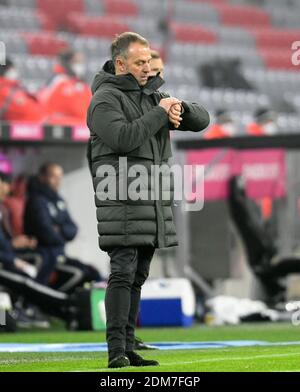 Ville de Munich, Allemagne. 16 décembre 2020. Firo: 16.12.2020, football, 1. Bundesliga, saison 2020/2021, FC Bayern Munich Muenchen - VfL Wolfsburg coach Hansi Flick FC Bayern Munich crédit: Martin Hangen/Pool/via firo Sportphoto pas de transfert aux utilisateurs secondaires dans les 48 heures! • la réglementation DFL interdit toute utilisation de photographies comme séquences d'images et/ou quasi-vidéo • usage éditorial SEULEMENT | usage dans le monde entier/dpa/Alamy Live News Banque D'Images