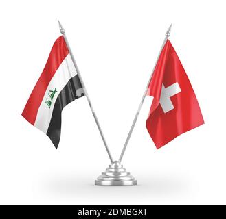 Suisse et Irak deux drapeaux de table isolés sur 3D blanc rendu Banque D'Images