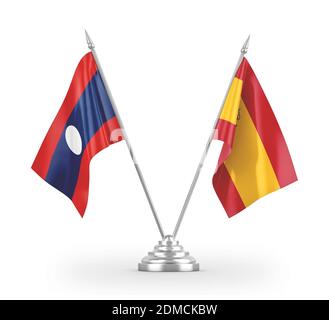 Espagne et Laos deux drapeaux de table isolés sur le rendu 3D blanc. Banque D'Images