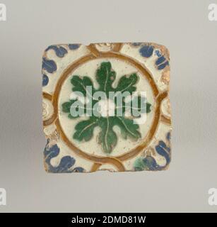 Two tiles, Glazed moulded earthenware, Moulded in low relief, with white, blue, green and light brown glazes. Interlacing bands forming tangent circles, large and small, enclosing green and blue foliage forms., Andalusia, Spain, 16th–17th century, tiles, Decorative Arts, Two tiles Stock Photo