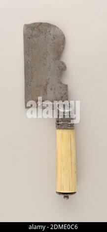 cleaver, ivory, steel, Large blade with straight lower edge. Decorative upper edge rounded towards the lower edge. Steel ferrule has worn floral pattern and an extension to which the blade is attached. Ribbed ivory handle, round in section. On top of handle a decorated steel mount and finial. Blade folds towards the handle., possibly Germany, 16th century, cutlery, Decorative Arts, cleaver Stock Photo