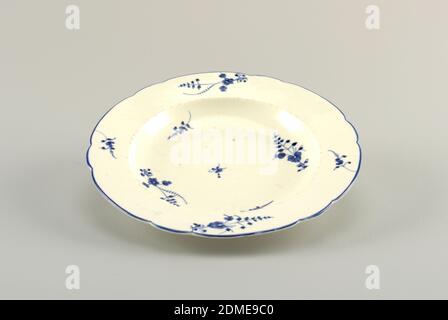 Soup Plate, Chantilly Porcelain Manufactory, French, active ca. 1725 - ca. 1789, soft paste porcelain, vitreous enamel, Straight marly with shaped edge, with underglaze blue line. Sprigs of flowers in underglaze blue in cavetto and on marly., France, ca. 1770, ceramics, Decorative Arts, plate, plate Stock Photo