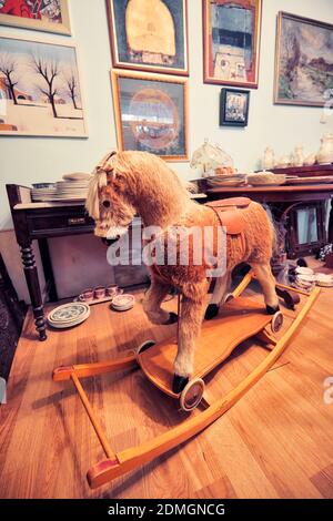 Ankara, Turkey - October, 2020: Vintage toy horse rocking chair displayed in an antique store in Ankara, Turkey. Stock Photo