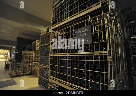 Ampuis on 2013/02/05. Cellars of the wine estate Domaine Vidal-Fleury. Pallet full of Cote Rotie wine bottles Stock Photo