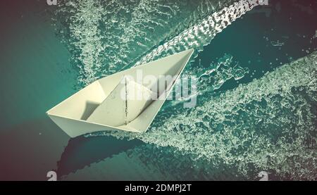 paper boat sails on the sea. 3d render Stock Photo